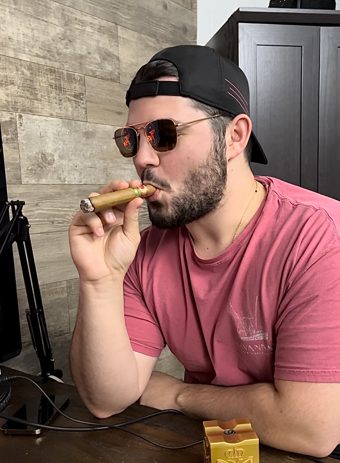 Zach smoking Arturo Fuente Cigar
